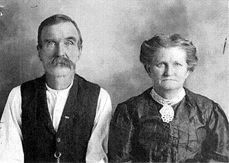 The real James L. Courtney and his wife, Susan Eubanks